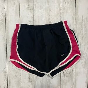 Women’s Nike Dri fit running shorts. Pink and black.
